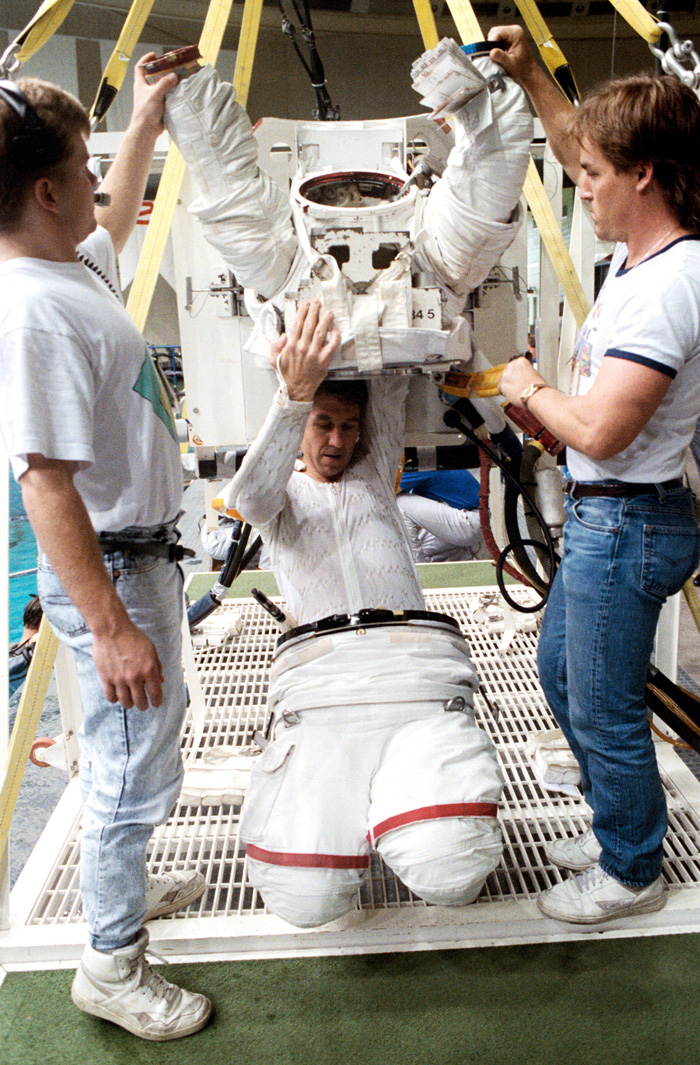 Space History Photo: Robert Springer Dons EMU for Training